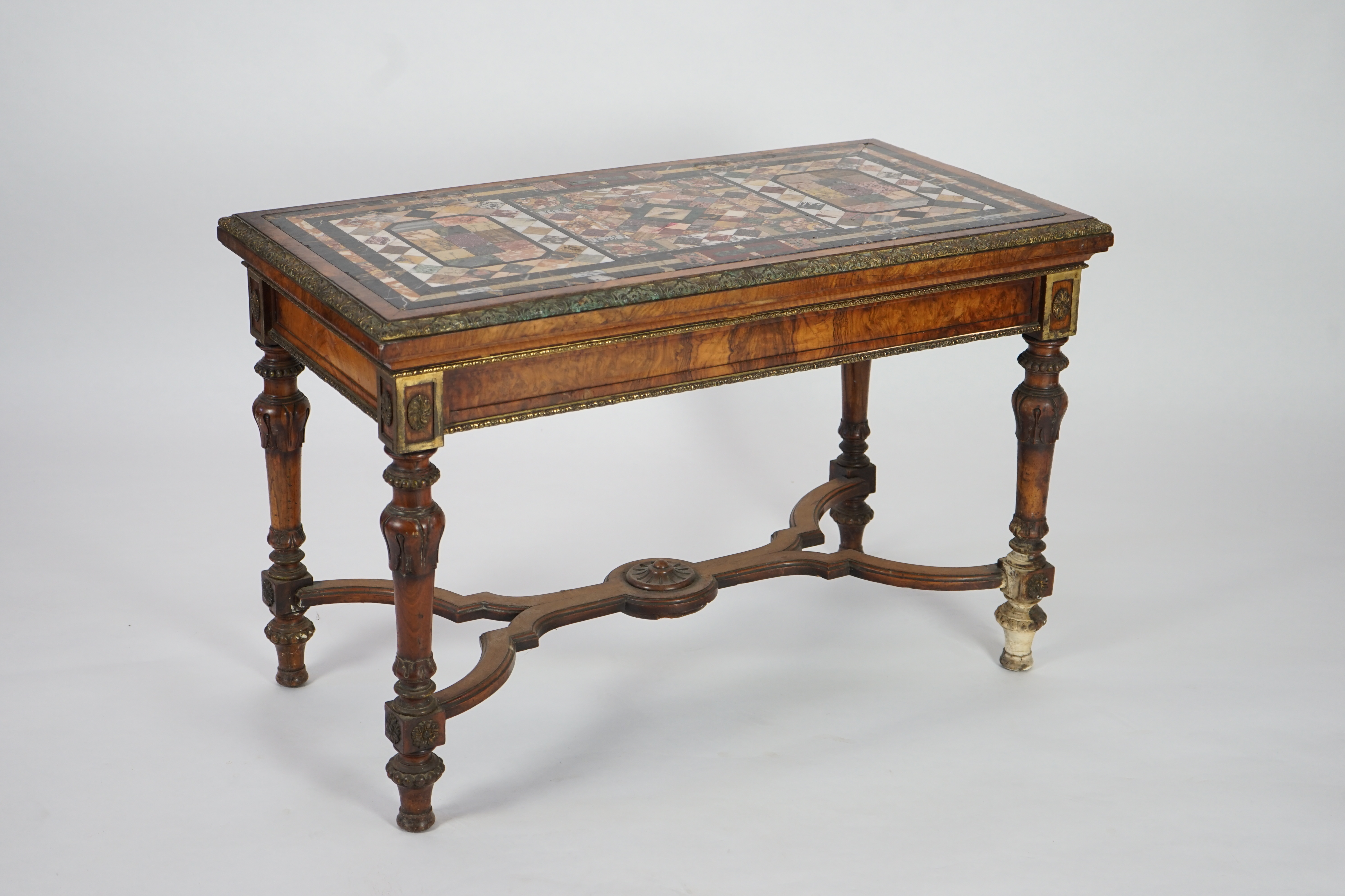 A mid Victorian ormolu mounted walnut pietra dura top centre table